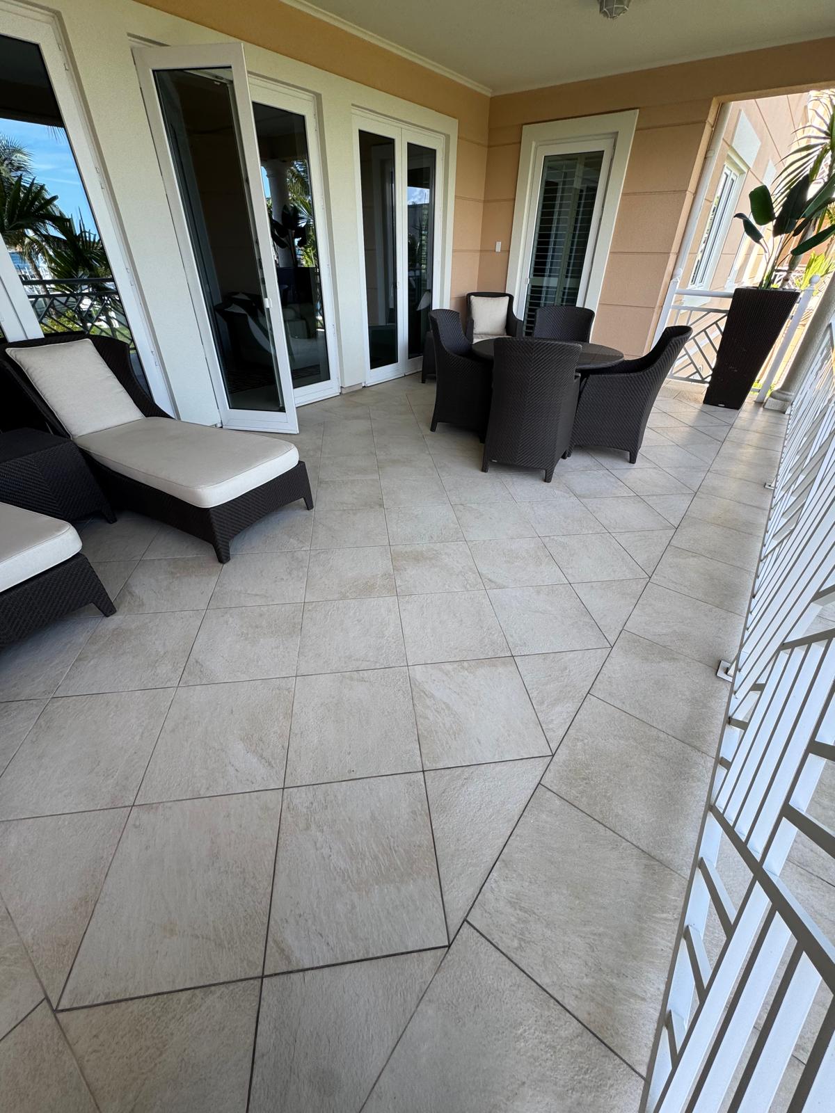 Bahamas Pro Steamers branded living room cleaning showcase